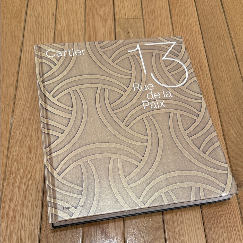 Cartier Hardcover Book in Champagne Beige with Embossed Circular Pattern
